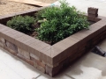 Stone and brick on the planters in the courtyard almost done!